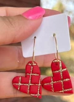 Red heart hoops with golden accents